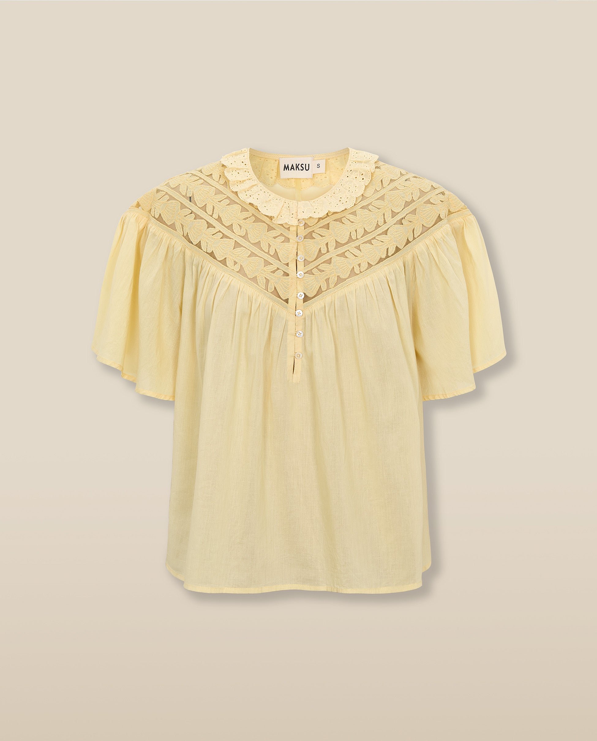 Blusa Kaeya de Maksu en el color amarillo mantequilla